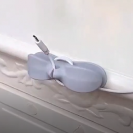 علاقة اسلاك وكوابل مرنة تثبت بواسطة لاصق ذاتي  علاقة اسلاك وكوابل مرنة تثبت بواسطة لاصق ذاتي